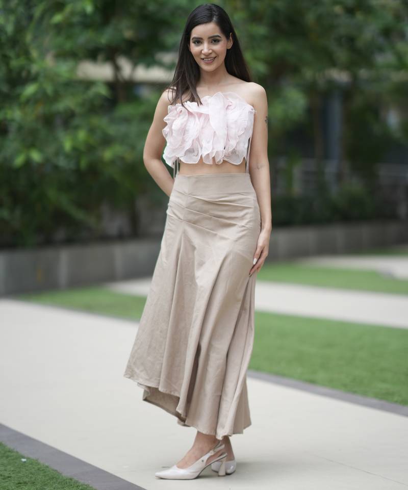 Soft pink ruffled top with pleated linen long skirt