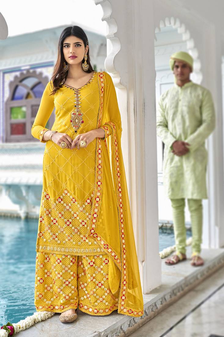 Pure georgette party wear sharara in yellow color with embroidery work