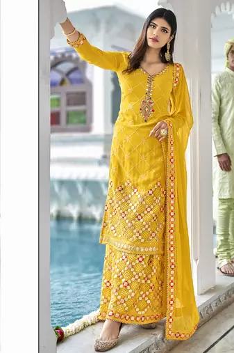 Pure georgette party wear sharara in yellow color with embroidery work