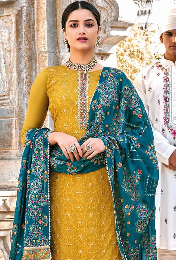 Pure georgette party wear sharara in yellow color with embroidery work