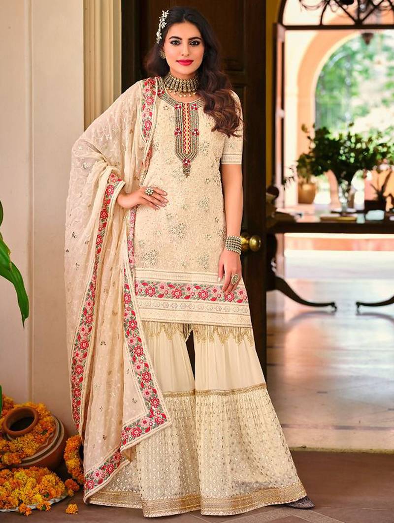 Pure georgette party wear sharara in off white color with embroidery work