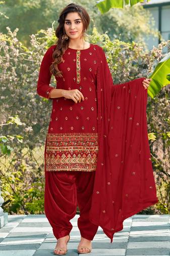 Pure georgette party wear suit in red color with embroidery work
