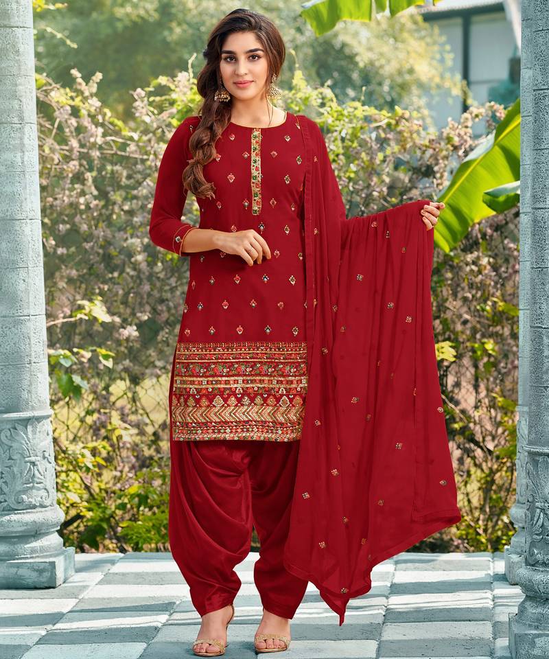 Pure georgette party wear suit in red color with embroidery work