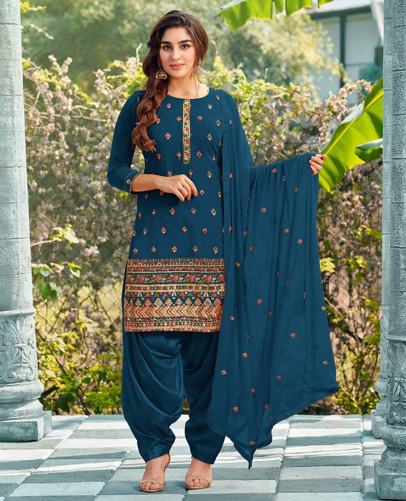 Pure georgette party wear suit in teal blue color with embroidery work