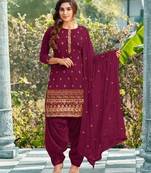 Pure georgette party wear suit in maroon color with embroidery work