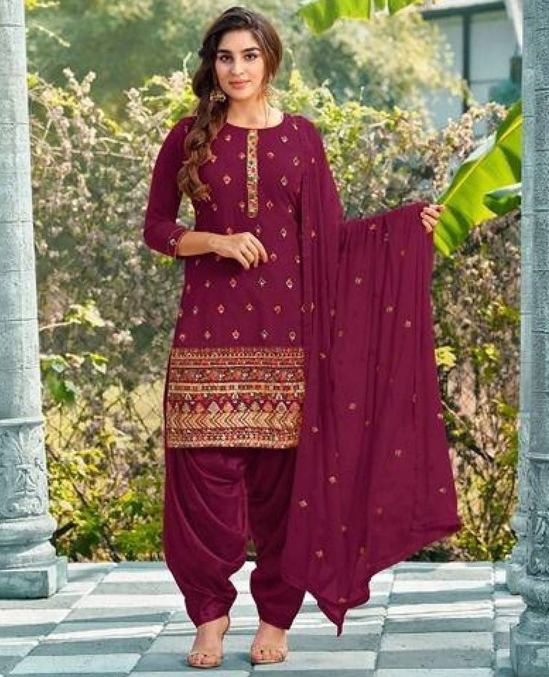 Pure georgette party wear suit in maroon color with embroidery work