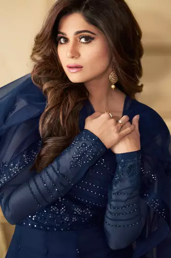 Butterfly net fabrics wedding wear gown in blue color with embroidery work