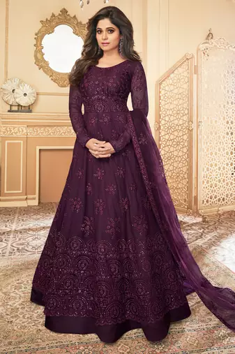 Butterfly net fabrics wedding wear gown in violet color with embroidery work