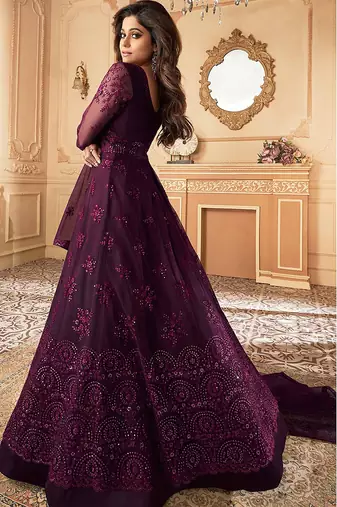 Butterfly net fabrics wedding wear gown in violet color with embroidery work