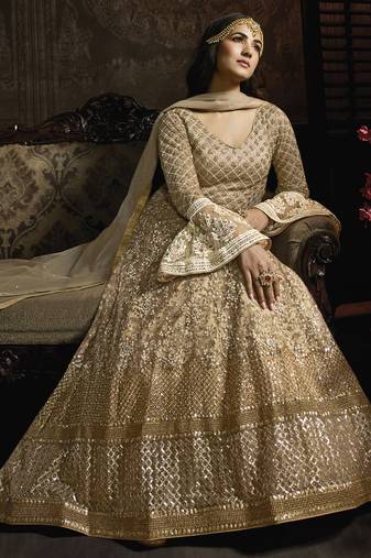 Butterfly net fabrics wedding wear gown in golden color with embroidery work