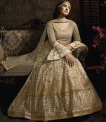 Butterfly net fabrics wedding wear gown in golden color with embroidery work