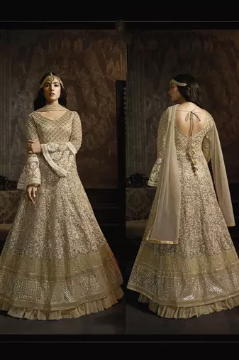 Butterfly net fabrics wedding wear gown in golden color with embroidery work