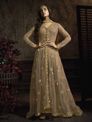 Butterfly net fabrics wedding wear gown in golden color with embroidery work 1