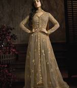 Butterfly net fabrics wedding wear gown in golden color with embroidery work
