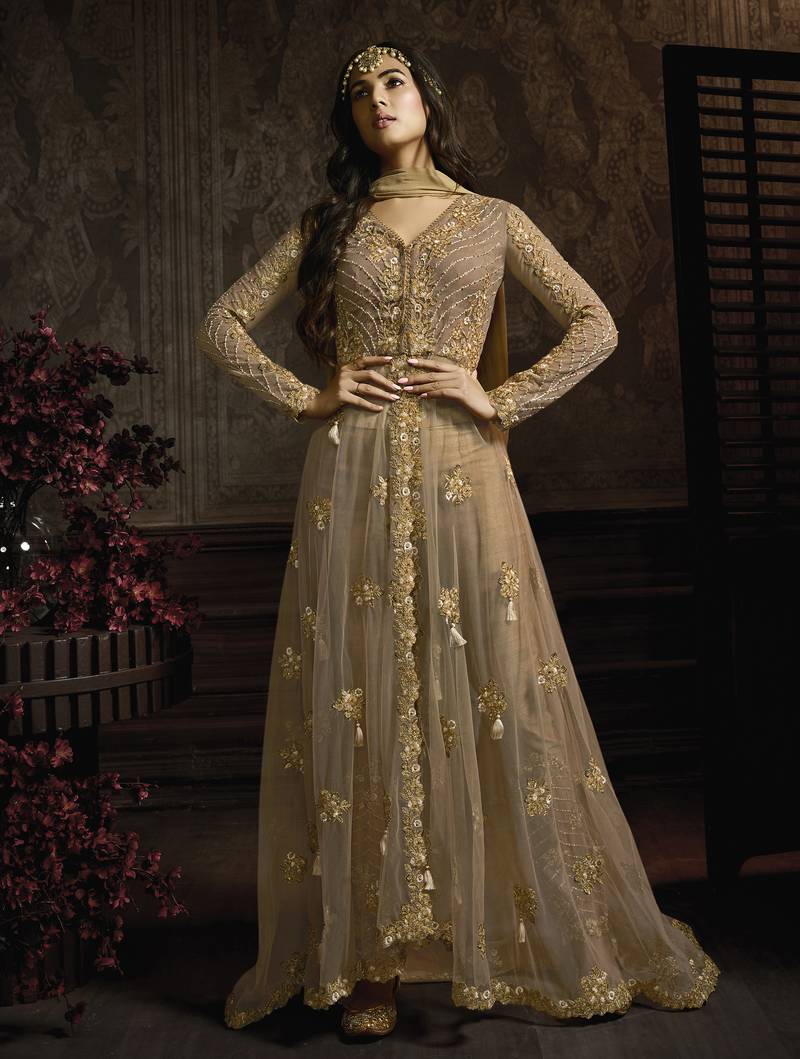 Butterfly net fabrics wedding wear gown in golden color with embroidery work