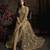 Butterfly net fabrics wedding wear gown in golden color with embroidery work