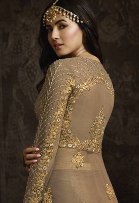 Butterfly net fabrics wedding wear gown in golden color with embroidery work 4