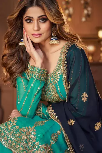 Georgette party wear sharara in turquoise color with embroidery work