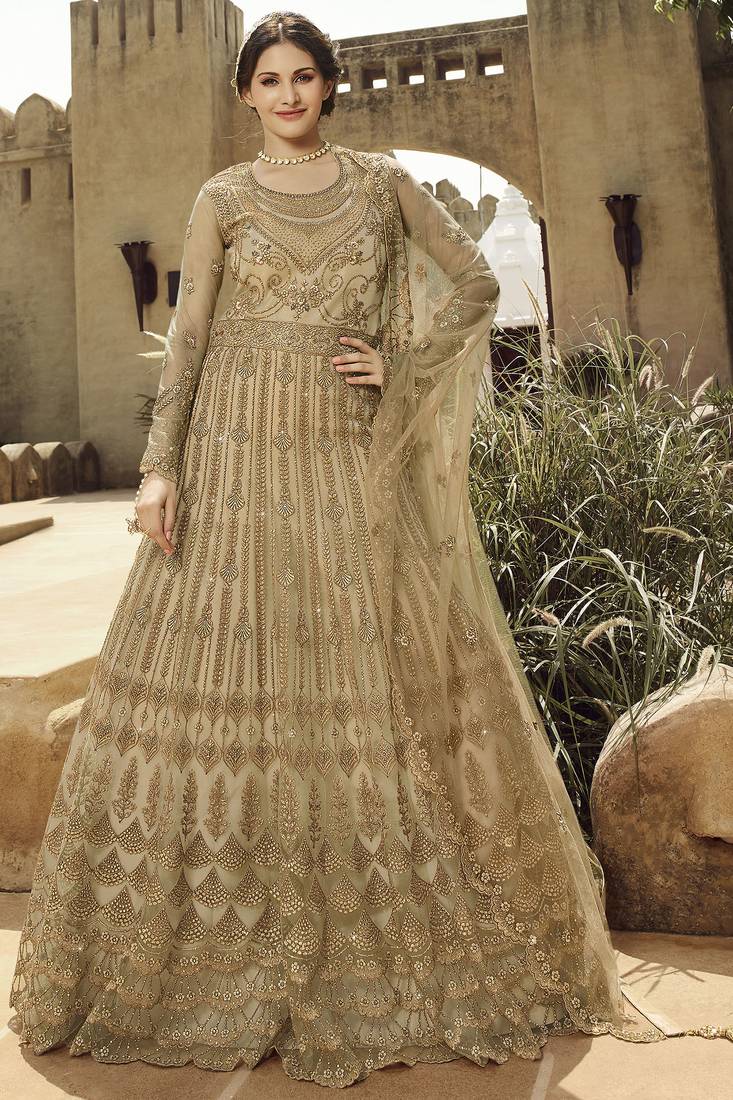 Soft premium net wedding wear gown in golden with embroidery & stone work