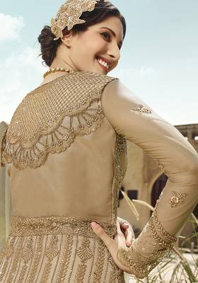 Soft premium net wedding wear gown in golden with embroidery & stone work 2