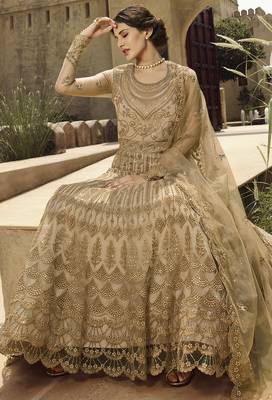 Soft premium net wedding wear gown in golden with embroidery & stone work 3