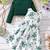 Green & white floral printed crepe fit & flare dress with shrug for girls