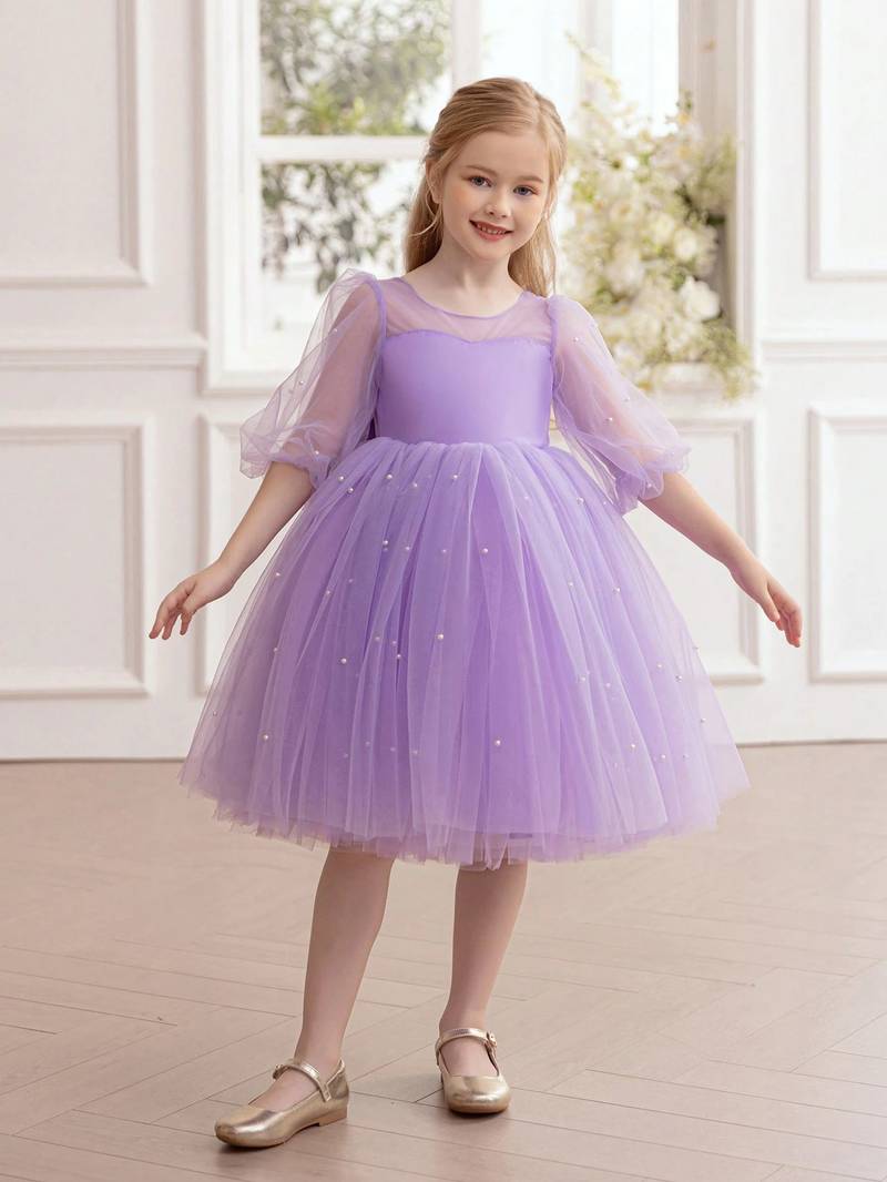 Purple pearl embellished net fit & flare party dress for girls