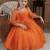 Orange pearl embellished net fit & flare party dress for girls