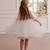White pearl embellished net fit & flare party dress for girls