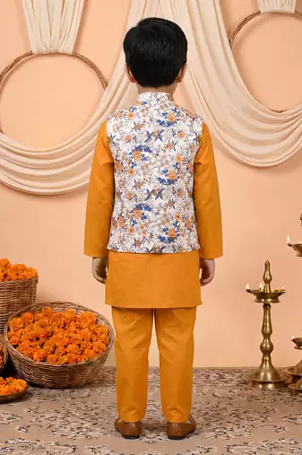 Boys mustard cotton blend kurta pyjama set with floral botanical printed waistcoat