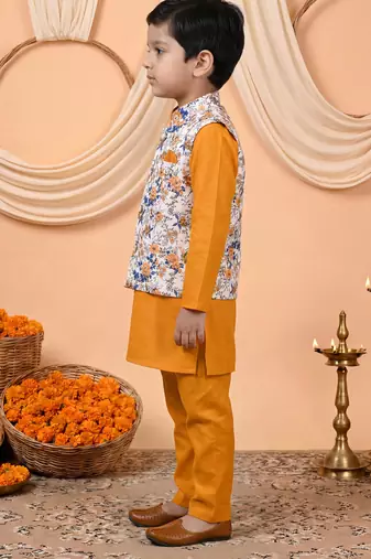 Boys mustard cotton blend kurta pyjama set with floral botanical printed waistcoat