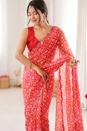 Bandhani printed zari georgette saree with mirror work border & silk blend blouse