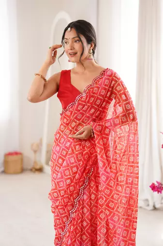 Bandhani printed zari georgette saree with mirror work border & silk blend blouse