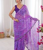 Bandhani printed zari georgette saree with mirror work border & silk blend blouse
