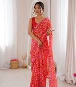 Bandhani printed zari georgette saree with mirror work border & silk blouse