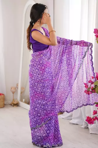Bandhani printed zari georgette saree with mirror work border & silk blend blouse