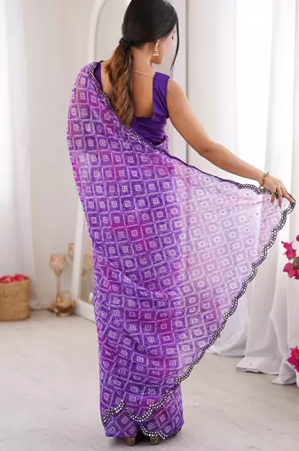 Bandhani printed zari georgette saree with mirror work border & silk blend blouse