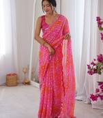 Bandhani printed zari georgette saree with mirror work border & silk blend blouse