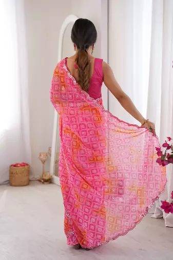 Bandhani printed zari georgette saree with mirror work border & silk blend blouse