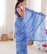 Bandhani printed zari georgette saree with mirror work border & silk blend blouse