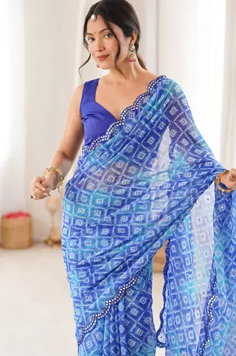 Bandhani printed zari georgette saree with mirror work border & silk blend blouse