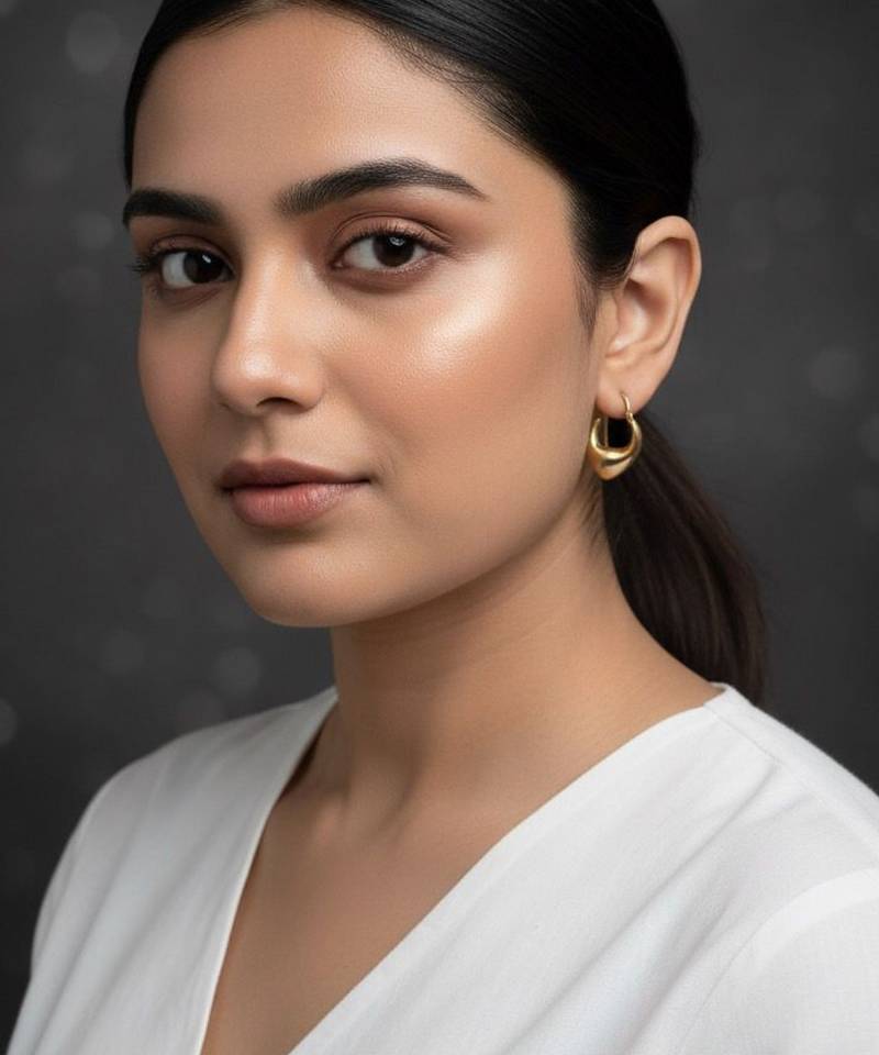 Golden crescent drop earrings
