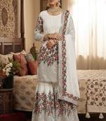 Designer white silk kurta set with heavy floral embroidery & sharara