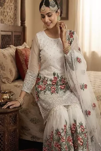 Designer white silk kurta set with heavy floral embroidery & sharara
