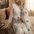 Designer white silk kurta set with heavy floral embroidery & sharara