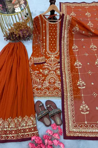 Orange faux georgette readymade suit with embroidered moti 