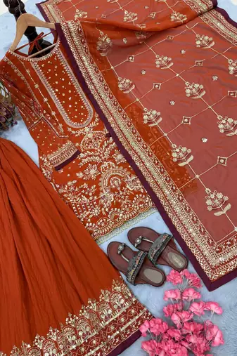 Orange faux georgette readymade suit with embroidered moti 