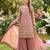 Pink faux georgette readymade suit with embroidery & moti work