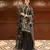 Black faux georgette readymade suit with embroidery & moti work