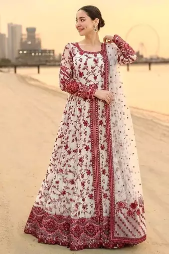 Red & white faux georgette readymade suit with embroidery & tassels attached